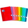 Caderno Oxford A5+ com grampos, quadriculado, 48 folhas com margem, capa flexível, ideal para anotações, cores sortidas.